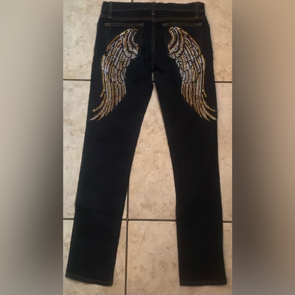Canzone jeans with wings in the back